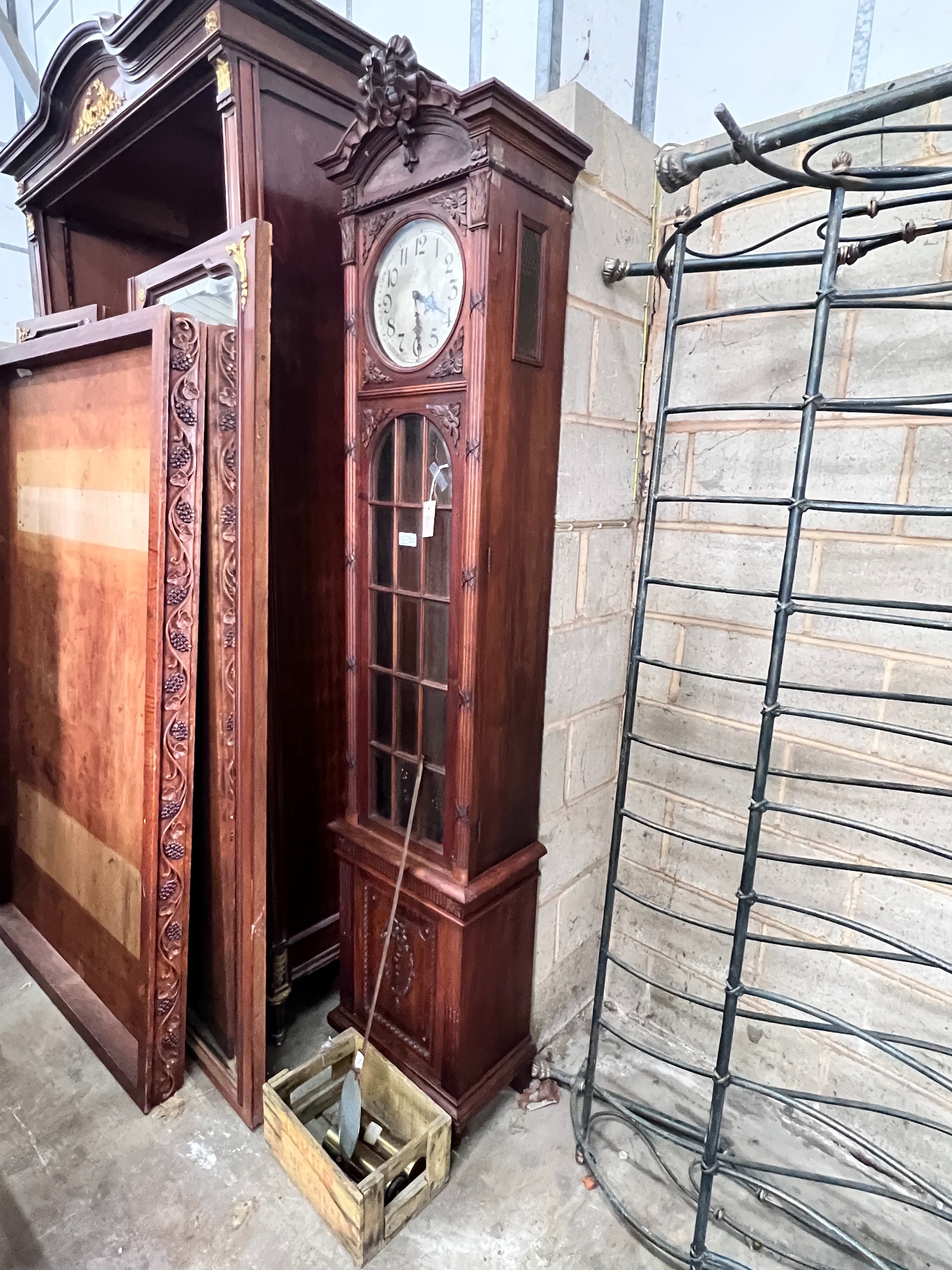 An early 20th century French carved walnut thirty hour longcase clock, height 224cm *Please note the sale commences at 9am.